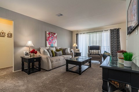 Large Living Room space at Knottingham Apartments in Clinton Township, MI
